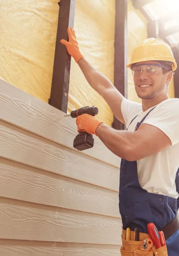 cheerful-builder-using-cordless-electric-drill-at-2025-03-26-00-42-19-utc